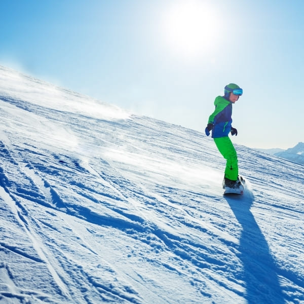 snowboarder boy going downhill